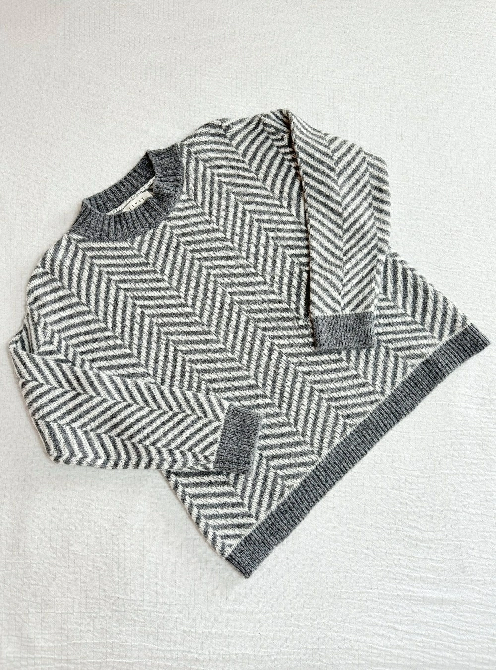 Jersey punto herringbone